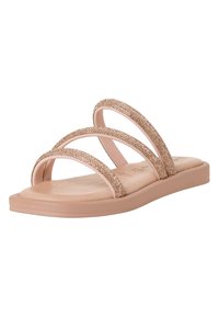 Sandali rosa caratterizzati da tre cinturini curvi decorati con dettagli luccicanti, una suola interna liscia e una suola piatta. Design semplice e minimalista.
