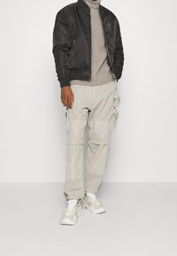 DRYKORN Strickpullover - brown