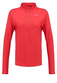 Punainen pitkähihainen urheilu-toppi, jossa on puolivetoketjumallinen kaulus, valmistettu joustavasta ja kevyestä kankaasta. Sisältää pienen heijastavan logon rinnassa.