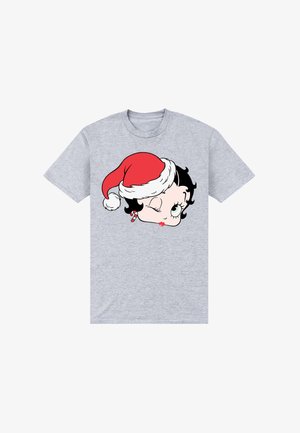 Graues T-Shirt mit einem Cartoon einer weiblichen Gesicht, das einen roten Weihnachtsmannhut trägt und zwinkert, während es einen Zuckerstab im Mund hält.
