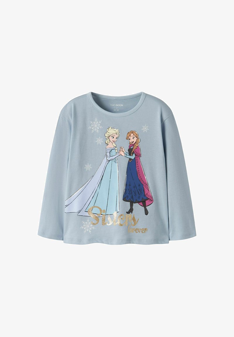 Chemise bleu clair à manches longues avec deux sœurs animées se tenant la main, des flocons de neige autour d'elles et le texte "Sisters forever" en lettres dorées.