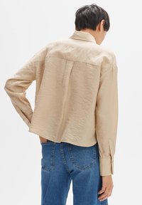 OPUS LANGARM FASTELLE - Button-down blouse - soft oat