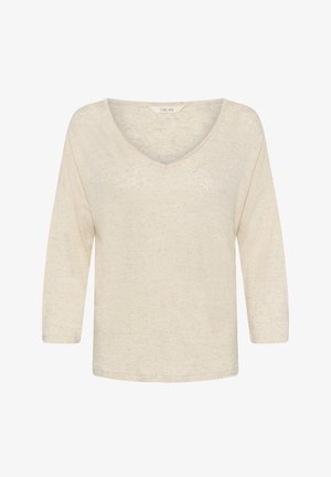 Maglione da donna color crema, a maniche lunghe con scollo a V, vestibilità morbida e tessuto leggermente strutturato.