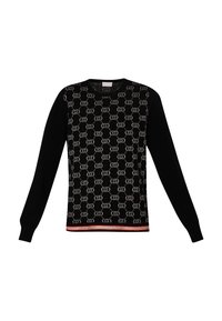 Pull noir à manches longues avec un devant à motifs présentant des formes géométriques entrelacées et un ourlet rayé rouge et blanc.
