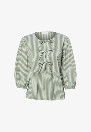 Blouse à rayures verticales vertes et blanches avec trois nœuds sur le devant, encolure ronde, taille marquée et longues manches bouffantes avec poignets élastiques.