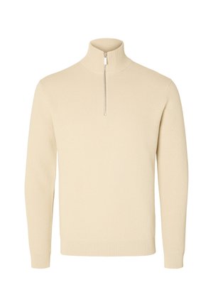 Beige, ribbed knit sweater with a high collar and half-length zipper. Features long sleeves and a fitted hem.