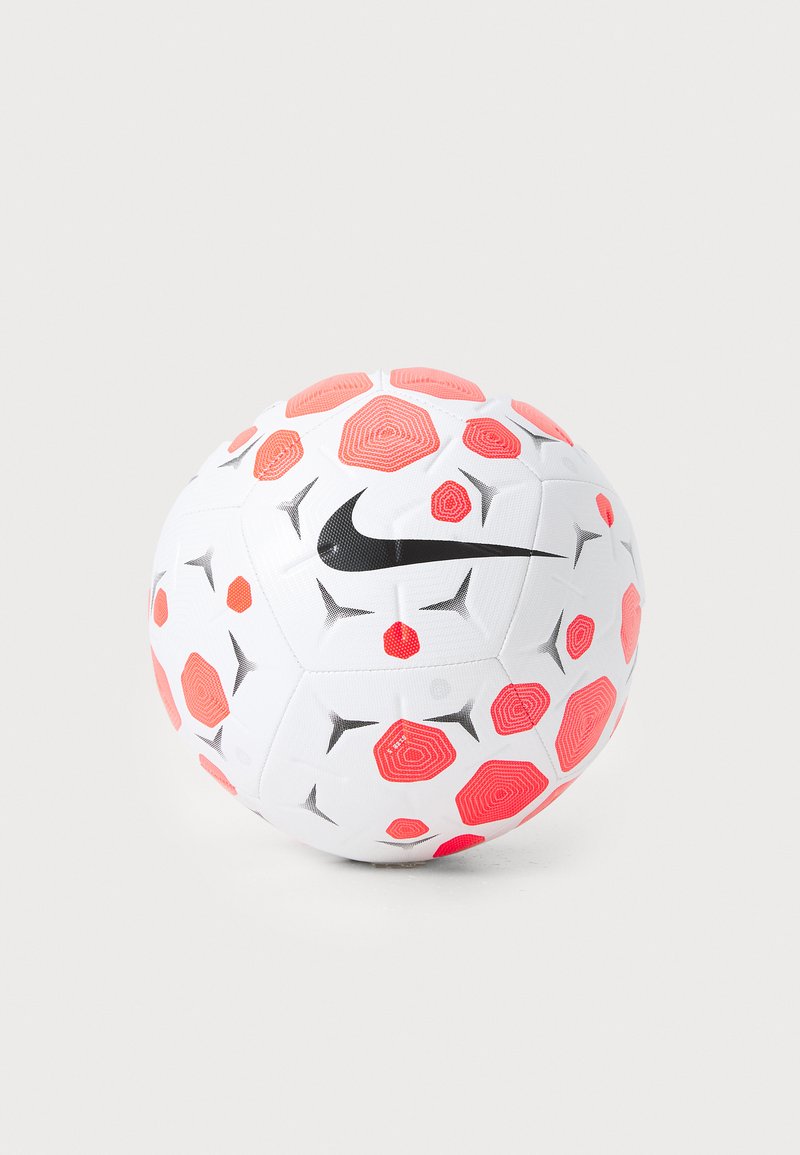 Nike soccer ball in white with a textured surface. Features red and black hexagonal designs, and a prominent black Nike logo. Round shape.
