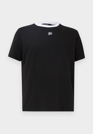 Black cotton t-shirt featuring a contrasting white crew neck and a small, centered logo on the chest. Short sleeves, relaxed fit.