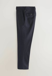 Navy pinstriped trousers made of a smooth fabric, featuring a sleek design, side pockets, and a single back pocket with a button detail.