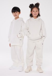 Champion EXCLUSIVE HOODIE UNISEX - Sportinis megztinis - off-white