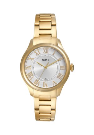 Montre-bracelet Fossil dorée avec cadran argenté, chiffres romains pour les heures, trois aiguilles et affichage de la date à 6 heures.
