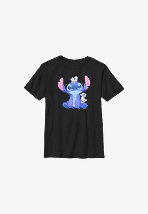 Schwarzes T-Shirt mit dem Cartoon-Charakter Stitch, der sitzt, einen kleinen weißen Vogel hält, und einem weiteren weißen Vogel, der auf seinem Kopf sitzt.