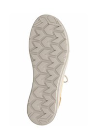 Suela de zapato de color claro con un patrón de huella en zigzag para mayor adherencia, presentando una superficie lisa y bordes redondeados. Material de goma flexible.