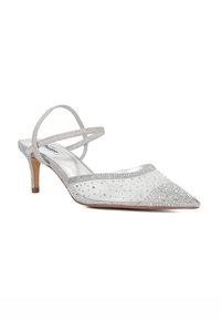 Silver strappy heel with pointed toe, transparent mesh upper, embellished with rhinestones, and a small block heel.