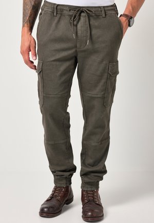 Cargo-Hosen in dunkelolivgrün, mit einem Kordelzugbund, Seitentaschen und elastischen Bündchen. Hergestellt aus einem weichen, strukturierten Stoff.