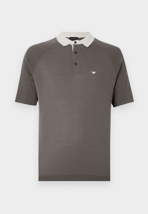 Grey polo shirt made of soft fabric with a contrasting white collar, three-button placket, and a small logo on the chest.
