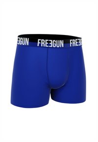 Shorts de boxeur bleus au design ajusté et à une taille élastique noire portant la marque "FREEGUN" en texte blanc. Texture lisse et couleur unie.