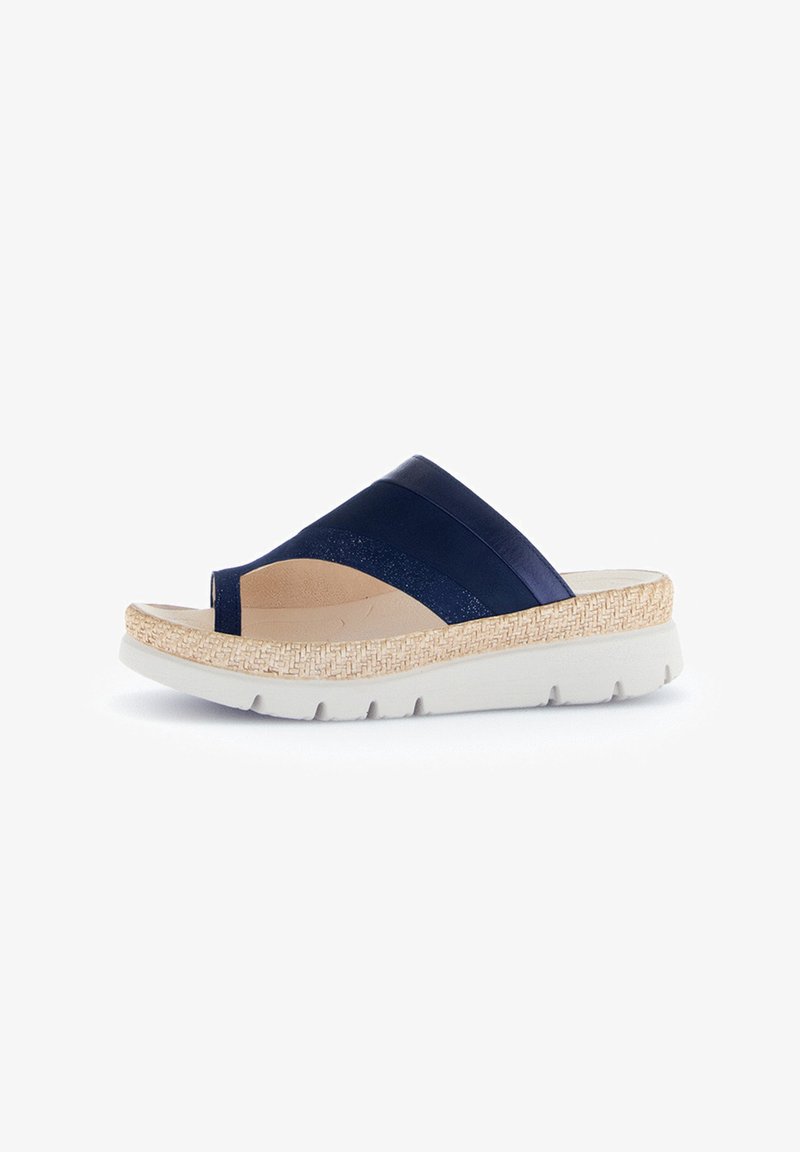 Navy blue slide sandals with woven jute detail, white rubber sole, and textured straps. Open-toe design with a cushioned footbed.