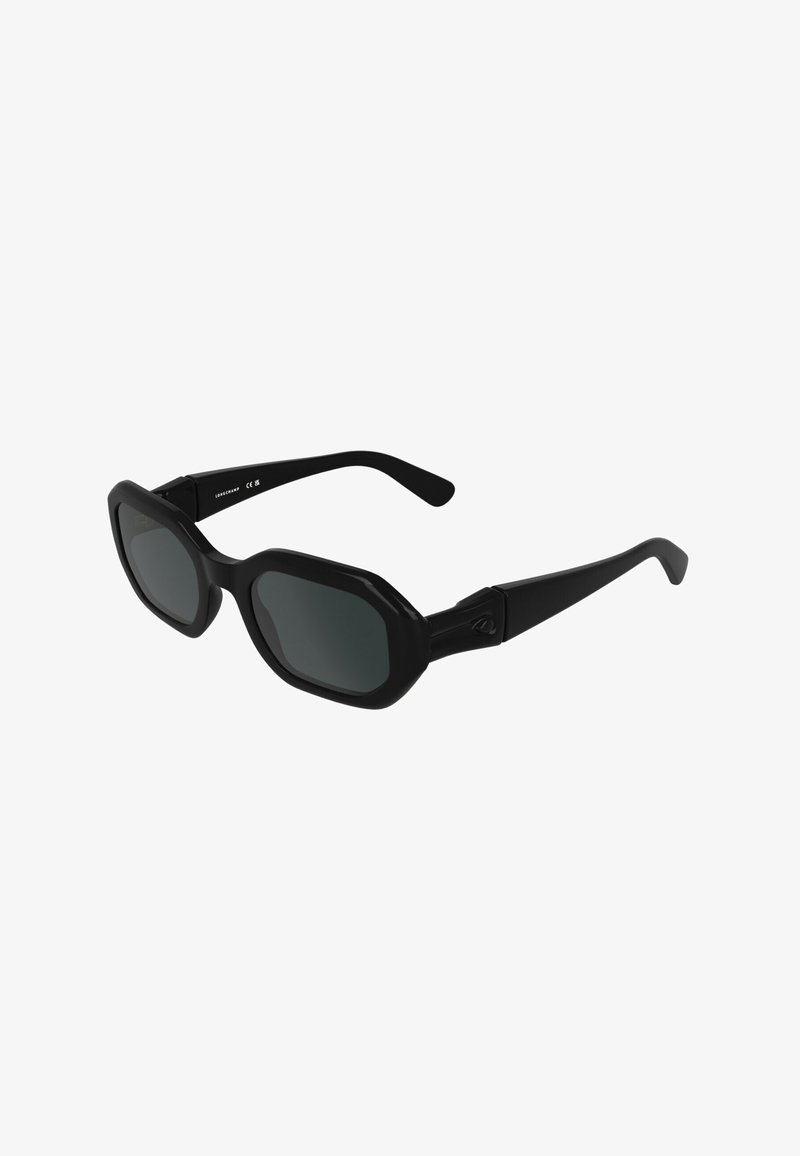 Black sunglasses with an octagonal frame, dark lenses, and straight temples; features a textured finish along the frame for grip.
