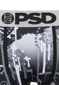 Boxer briefs da uomo in bianco e nero con una stampa grafica decorativa. Presentano un elastico grigio con il logo "PSD" e un tessuto testurizzato.