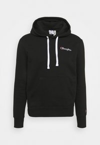 Black hoodie made of cotton blend, featuring a front pocket, white drawstrings, and a small embroidered logo on the chest.