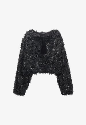 Czarna krótka kurtka z futerka ekologicznego z długimi rękawami, ozdobiona cekinami i z przodu zawiązywana na kokardę. Miękka tekstura i warstwowy fason.