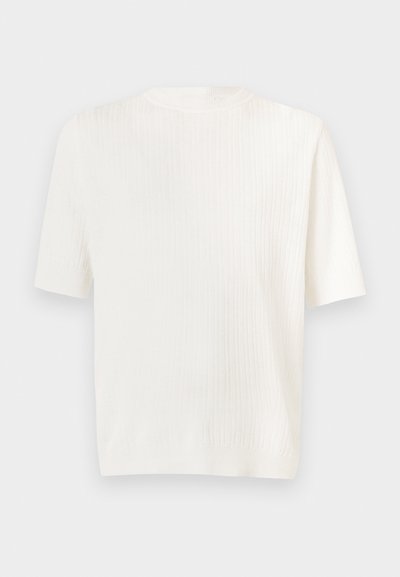 Top scurt din tricot cu mânecă scurtă, de culoare albă. Decupaj rotund și textură moale. Croi drept, cu un luciu subtil. Design ușor și versatil.