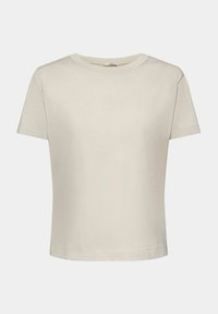 Krótki rękaw, okrągły dekolt, t-shirt w jasnym beżowym kolorze z bawełny o luźnym kroju. Zawiera subtelną nicią wykończenie na dolnym brzegu i rękawach.