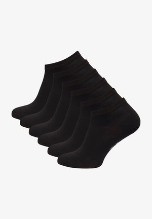 Calze nere alla caviglia, realizzate in tessuto elasticizzato, dotate di un bordo a coste e di una superficie liscia. Set di sei paia.