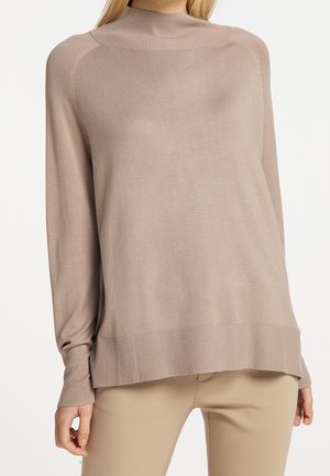 Maglione beige a maniche lunghe con un alto collo a coste, vestibilità leggermente over-size e polsini a coste, realizzato in un tessuto knit morbido e leggero.