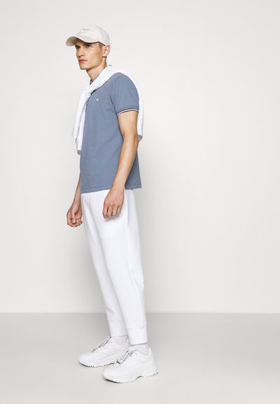 Emporio Armani TROUSER - Calças de fato de treino - bianco ottico