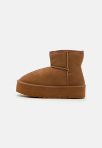 Bottines à plateau - taupe