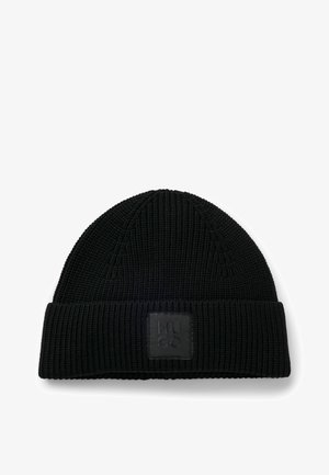 Black knit beanie with a ribbed texture, featuring a folded cuff and a rectangular logo patch embossed with "HUGO" on the front.