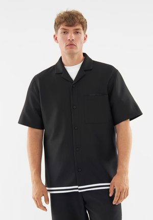 PARKER - Košeľa - black
