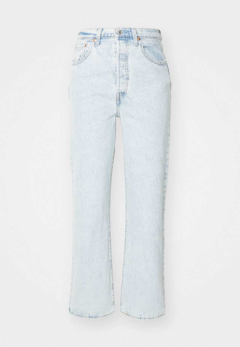 Jeans de tiro alto en azul claro, con un corte recto y cropped. Fabricados en denim con un lavado desgastado, presentan un cierre clásico de botón y cremallera.