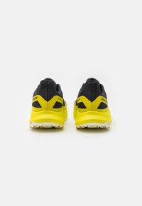 Salomon ULTRA FLOW - Pantofi alergare trail - black/sulphur spring/transparent yellow