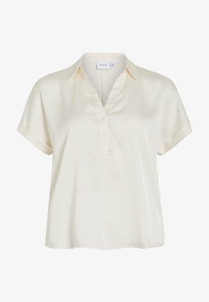 Blouse crème à manches courtes avec encolure en V, patte de boutonnage et col classique en tissu lisse.