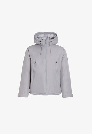 Šviesiai pilkas, su kapuce, nuo priekinio užtrauktuko užsegamas švarkas su dviem užtrauktukais šoninėse kišenėse ir elastinga liemene. Lygus, drėgmei atsparus audinys.