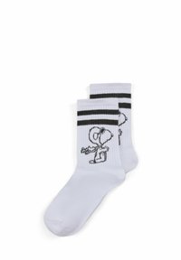 Weiße Baumwollsocken mit einem schwarzen Snoopy-Design und zwei schwarzen horizontalen Streifen nahe dem oberen Rand. Strukturmaterial mit Rippenspitze.