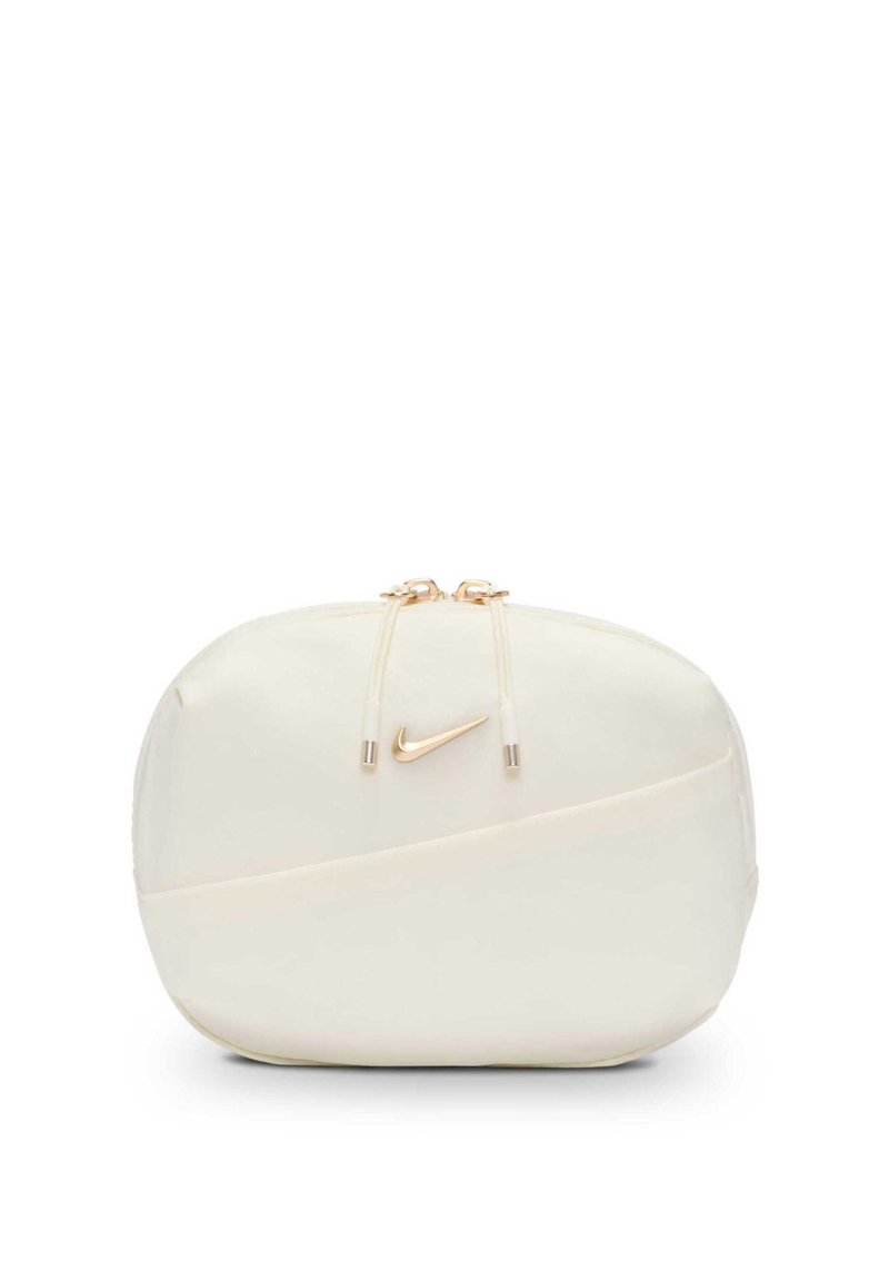 Piccola pochette Nike color crema con cerniere dorate e logo swoosh dorato sul davanti.