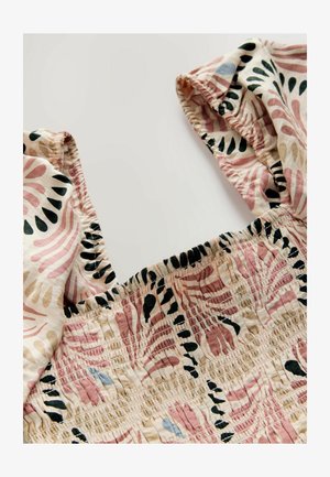 Katoenen top met een smock-bodice; heeft een patroon van abstracte vormen in roze, zwart en beige; gerimpelde schouderbanden versterken het ontwerp.