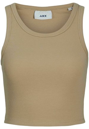 Débardeur écru à côtes, avec un col rond et sans manches, présentant une coupe simple et ajustée, ainsi qu'une étiquette de la marque au niveau du cou.