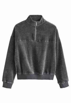 Pull en velours côtelé gris avec un col montant, fermeture éclair demi-longueur et poignets côtelés. Présente des rayures horizontales et une coupe décontractée.