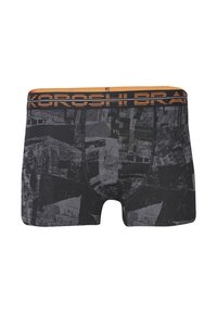 Calzoncillos boxer negros con un patrón gris texturizado, que presentan una cinturilla de marca en color naranja. El material parece suave y elástico.