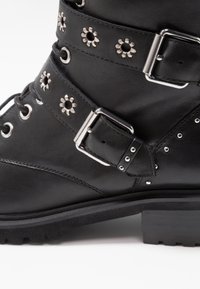 Steven New York Botines camperos - black