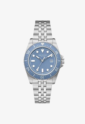 Ceas de mână din metal argintiu cu cadran albastru, marcaje orare albe, fereastră pentru dată la ora 3 și bezel rotativ marcat în minute.