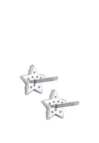 Boucles d'oreilles en argent en forme d'étoile avec une finition polie et de petites découpes rondes, montées sur des tiges fines pour un maintien sécurisé.
