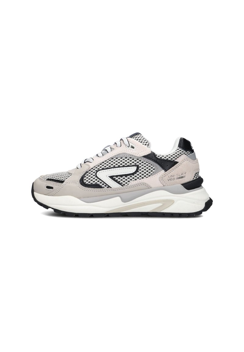 Sneaker with a mesh upper in light gray and black accents, featuring a cushioned sole, contrasting stitching, and a modern athletic design.