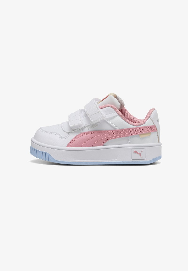 White sports shoe with pink accents, featuring a textured leather upper, dual Velcro straps, cushioned collar, and pastel blue outsole.