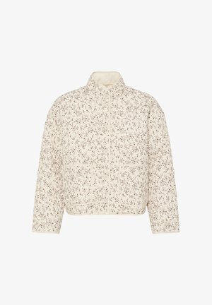 Veste matelassée couleur crème avec motif floral brun délicat, col montant, fermeture par boutons et deux poches frontales.